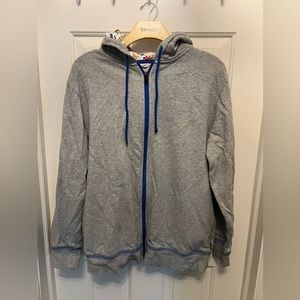 Tomboy X zip up hoodie with comic lining inside hood